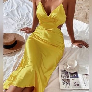 Satin yellow tie back dress size small never worm